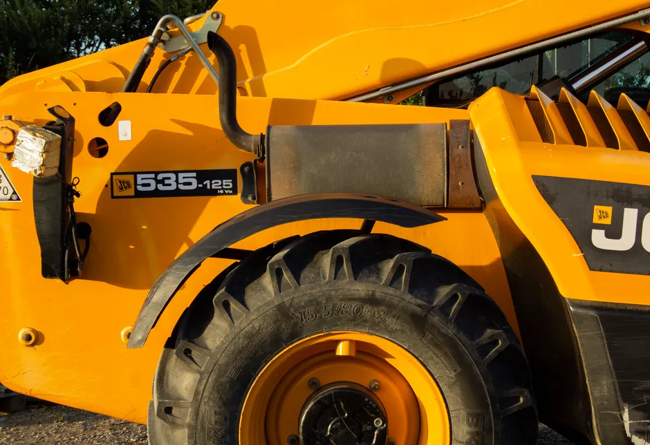 Detailed view of a JCB 535-125 telehandler showcasing its components.